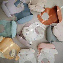 Load image into Gallery viewer, Mushie Peach Terrazzo Silicone Bib - Have To Have It NZ