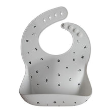 Load image into Gallery viewer, Mushie White Letters Silicone Bib - Have To Have It NZ