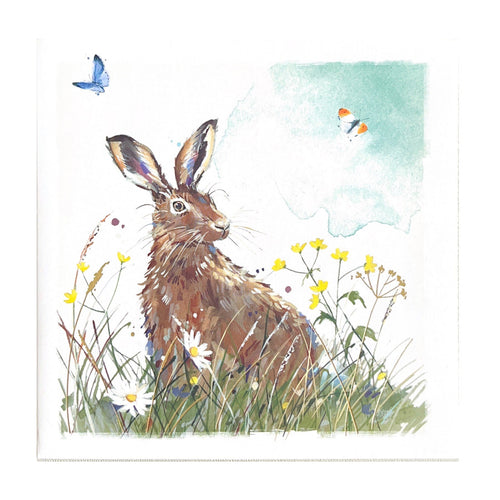 A beautiful notecard features a charming illustration of a hare in a flower meadow, printed on high-quality cardstock.